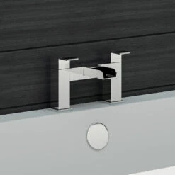 Vellamo Reve Waterfall Basin Mixer & Waterfall Bath Filler Value Pack -Vado Sale Store primary vellamo reve deck mounted waterfall bath filler tap lifestyle2 1
