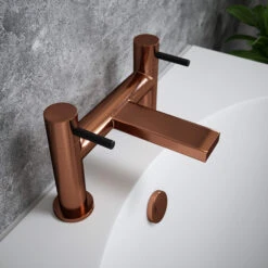 The Tap Factory Vibrance Polished Copper Deck Mounted Bath Filler With Vanto Black Handles 12 The Tap Factory Vibrance Polished Copper Deck Mounted Bath Filler With Vanto Black Handles -Vado Sale Store tap factory brushed copper bath filler black handles lifestyle