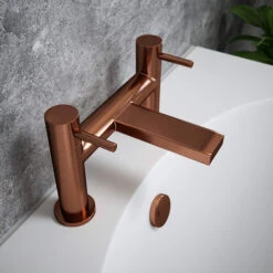 The Tap Factory Vibrance Polished Copper Deck Mounted Bath Filler With Vanto Black Handles